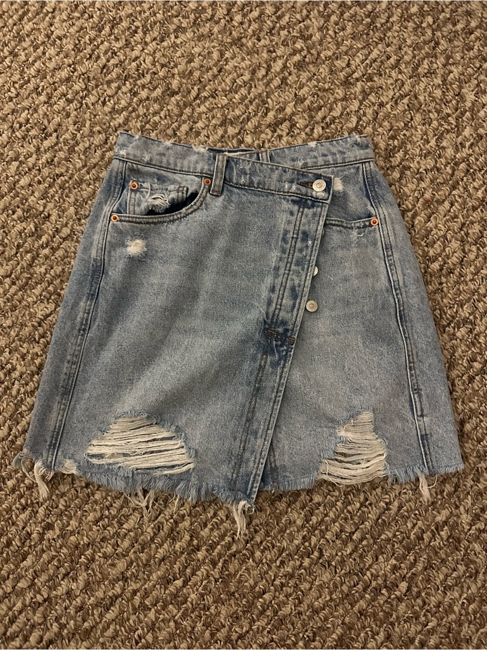 We the Free Distressed Light Wash Denim Cross Button Skirt
